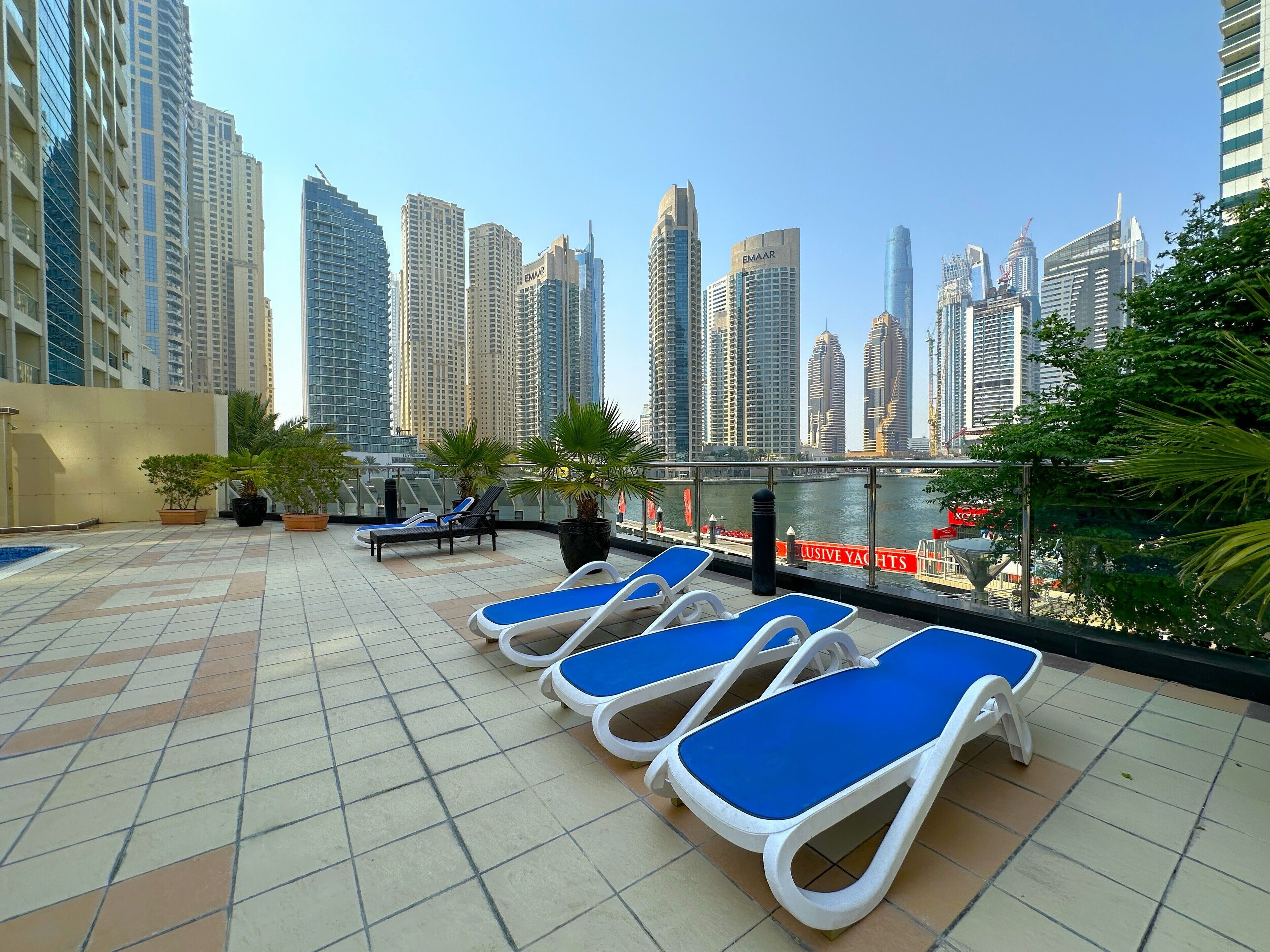 Outdoor pool, open 10:00 AM to 6:00 PM, pool umbrellas, pool loungers