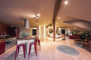 Presidential Penthouse | Living area | 42-inch TV with digital channels
