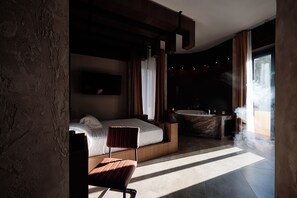 Chambre Deluxe, 1 grand lit, baignoire à jets | Minibar, coffres-forts dans les chambres, décoration personnalisée