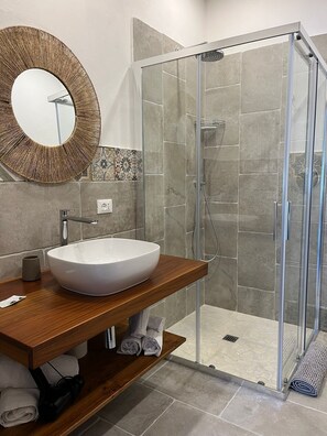Hair dryer, bidet, towels, soap