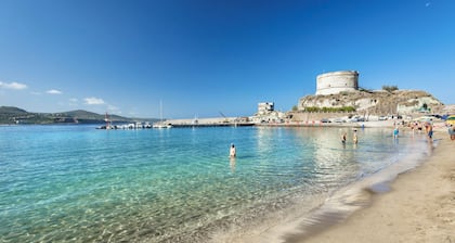 Residence with private beach in Bosa Marina