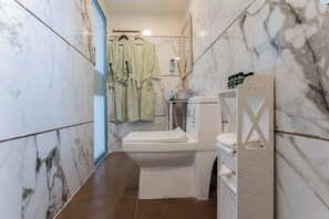 Shower, towels, soap, shampoo