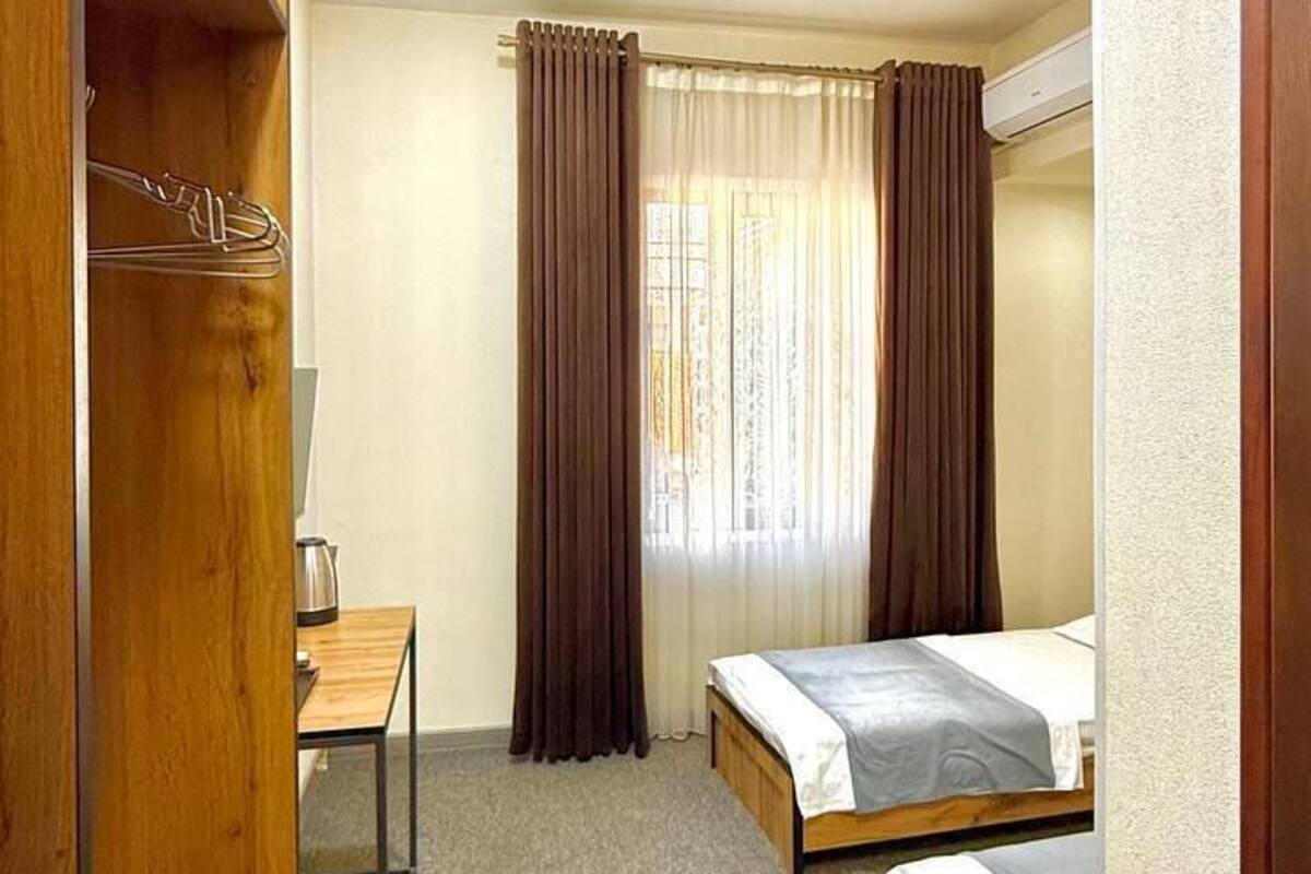 Twin Room, 2 Twin Beds | Premium bedding, iron/ironing board (on request), WiFi (free)