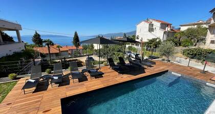 Deluxe sea view apartment with pool close to beach in beautiful Rijeka