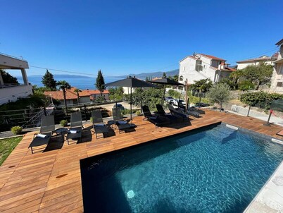 Deluxe sea view apartment with pool close to beach in beautiful Rijeka