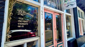 A storefront with a sign reading "Dr. Bombay's Tea, Pastries, Desserts, Wi-Fi". - Walkable neighborhood! The Sun House - Entire home to yourself (Atlanta)