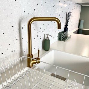 Shower, hair dryer, towels, toilet paper