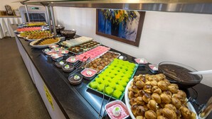 A buffet with various desserts and pastries. - Club Bellamare Beach (Marmaris)