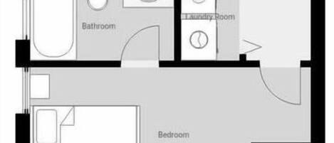 Ein Grundriss eines Hotels mit einem Schlafzimmer, zwei Bädern, einem Waschraum, einer Diele und einem Deckbereich.