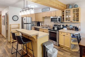 Fridge, microwave, oven, stovetop - AJ’s Outpost | Ski-In Condo | Fireplace + Hot Tub (Breckenridge)