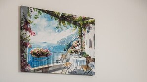 A bed with a dark headboard, white linens, and a neatly folded towel. - One Bedroom Apartment 8 with Balcony (Omisalj)
