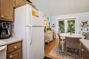 Fridge, microwave, oven, stovetop - Sunkissed: Comfy Cottage with Ocean Views and Close Beach Access (Oak Island)