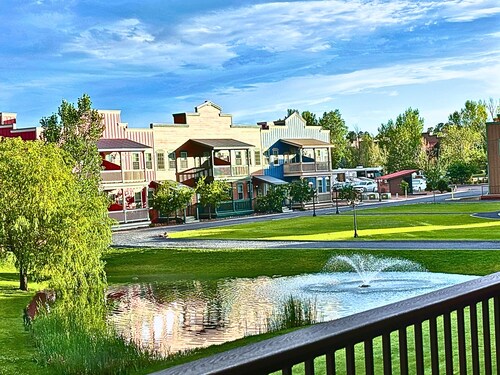 Forest edge, wild mustangs nearby, balcony views,