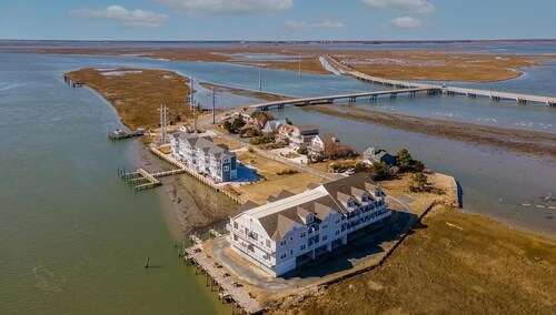 Tranquil Tides Retreat by Seaside Vacations & Sales