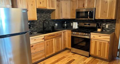 Six bedroom lake front cabin with hot tub and outdoor fire pit