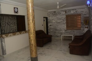 Room, 1 Bedroom, Balcony, Garden View | Living room - Room-deluxe Double Bed in Royal Blue Gue (Lomé)