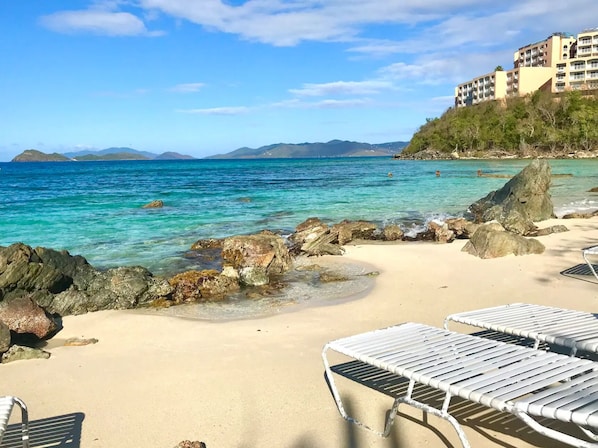 On the beach, sun loungers, beach towels