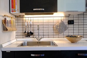 Apartment, Balcony | Private kitchen | Espresso maker, electric kettle