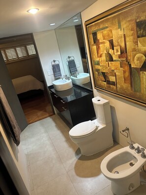 Shower, bidet, towels, soap