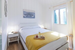 2 slaapkamers, een strijkplank/strijkijzer, gratis wifi, beddengoed