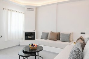Smart TV, fireplace, books - Omnia Suite located in Fira Capital of Santorini and very close to the caldera. (Thira)