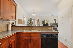 Fridge, microwave, oven, stovetop - Fireside Retreat | Hot Springs | Fireplace | Pets (Radium Hot Springs)