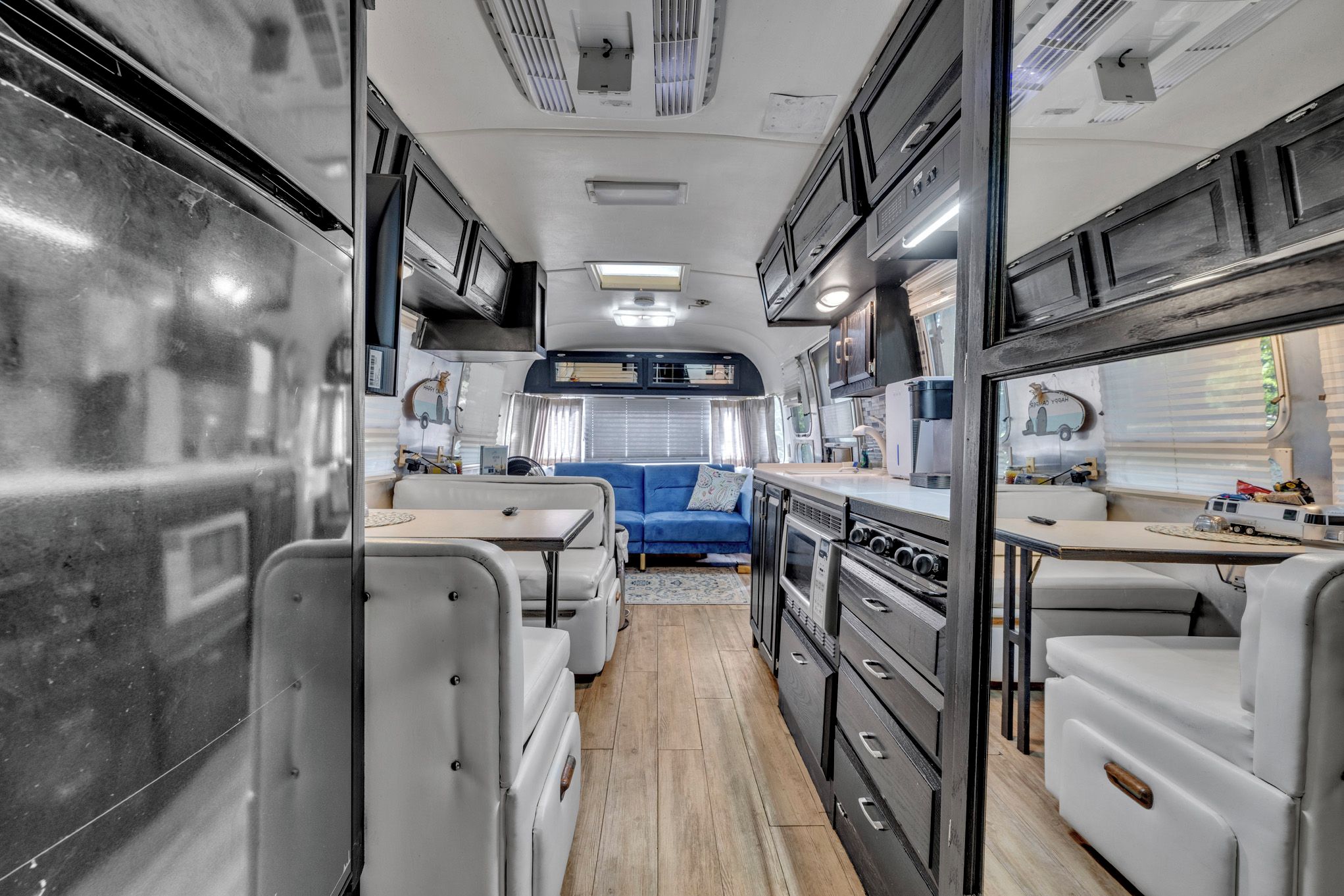 A look through the Airstream’s open layout from bath to lounge