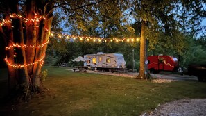 Property grounds - Cozy Riverside 2-bedroom RV in Charming Burton Ohio (Burton)