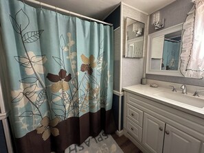Shower, towels, toilet paper