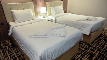 Chambre double ou avec lits jumeaux, Plusieurs lits | 1 chambre, espace de travail pour ordinateurs portables