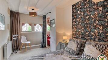 1 chambre, fer et planche Ă repasser, Wi-Fi gratuit, draps fournis