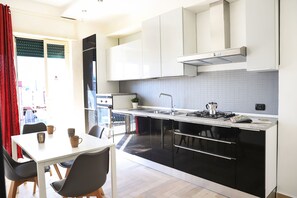Apartment, Balcony | Private kitchen | Fridge, oven, stovetop, coffee/tea maker - La Casa di Partenope by Wonderful Italy (Naples)