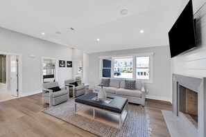 Smart TV, fireplace, foosball, stereo
