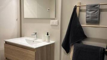 Hair dryer, towels, soap, toilet paper