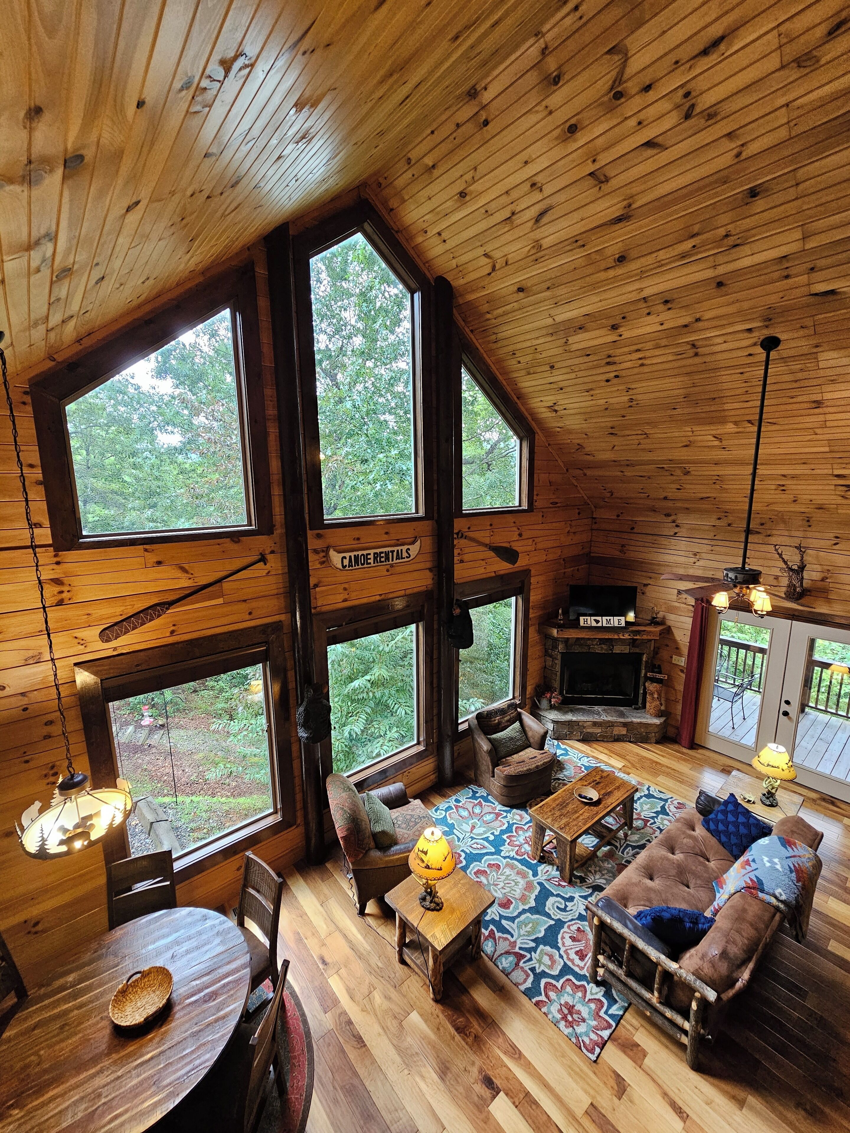 Looking down from the loft into the main room. Futon/sofa for an extra bed.