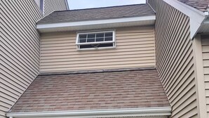 A house with a beige exterior, a white front door, and a small porch area. - Beatiful Studio in Raynham MA, minutes to shopping, Massasoit State park, etc (Raynham)