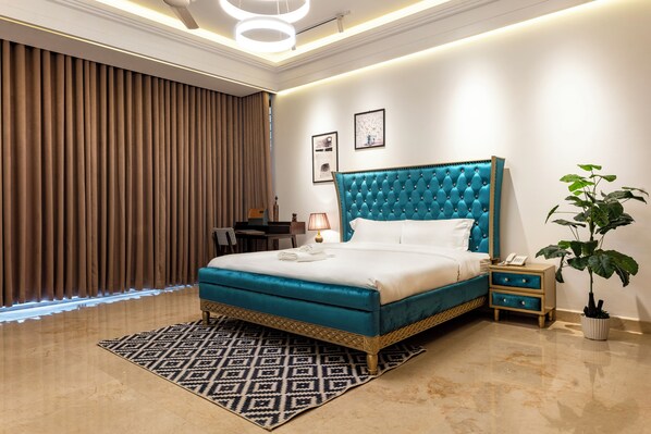 Camera Executive, vista lago | Biancheria da letto di alta qualità, minibar, una cassaforte in camera