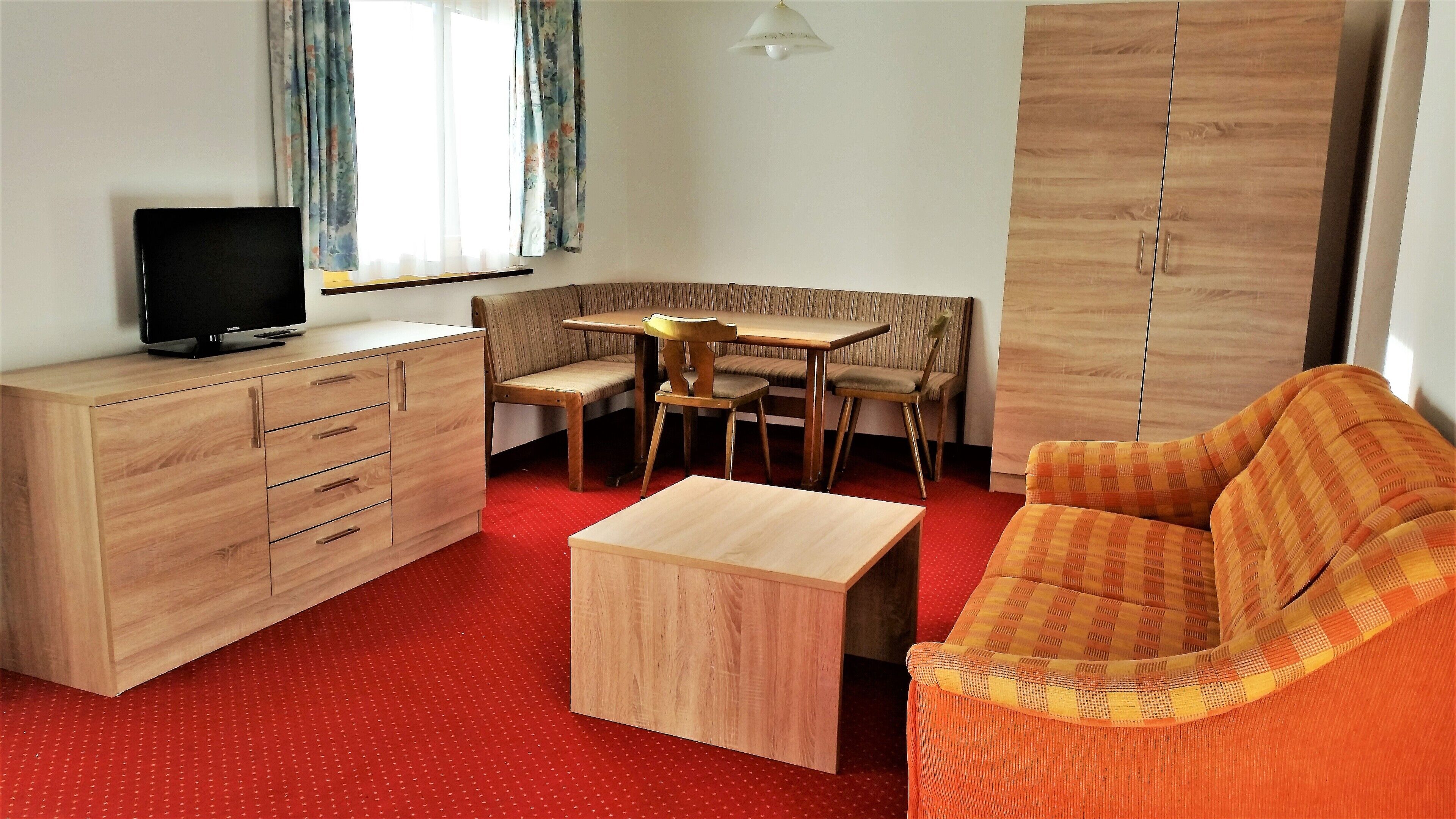 Comfort Apartment, Balcony, Mountain View | Living area | Flat-screen TV