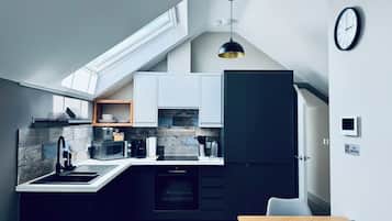 Comfort Apartment | Private kitchen | Coffee/tea maker, electric kettle, eco-friendly cleaning products