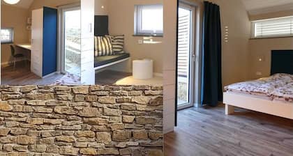 Modern detached vacation home for two on the edge of the village in the Bavarian Rhön.