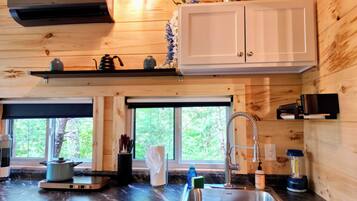 Fridge, microwave, stovetop, coffee/tea maker