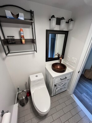 Hair dryer, towels, soap, shampoo