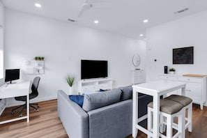 Condo, 1 Queen Bed with Sofa bed, Patio, City View (Poolside Suite) | Living area | 50-inch flat-screen TV with digital channels - Luxury Resort-style Living Centrally Located (New Braunfels)