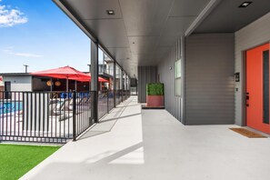 Condo, 1 Queen Bed with Sofa bed, Patio, City View (Poolside Suite) | Terrace/patio