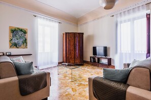 Apartment, Balcony | Living area | 35-inch TV with digital channels - La Maison di Ortigia by Wonderful Italy (Syracuse)