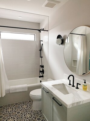 Hair dryer, towels, soap, shampoo
