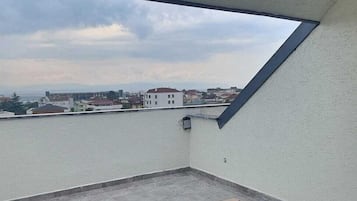 Suite familiar, vistes a la ciutat | Balcó
