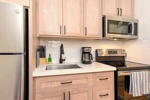 Refrigerador, microondas, horno, placa de cocina