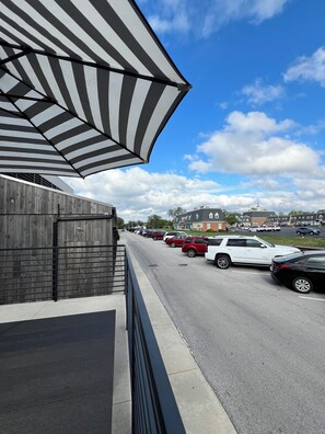 Guests can park their vehicles in the designated area adjacent to the building.