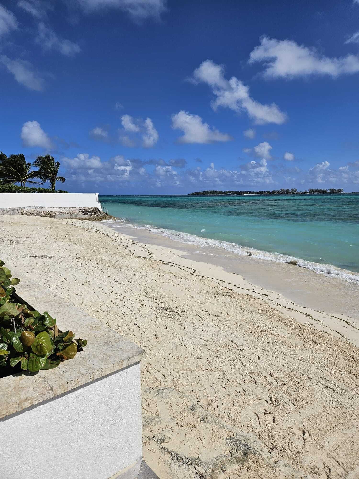 On the beach, sun loungers, beach towels